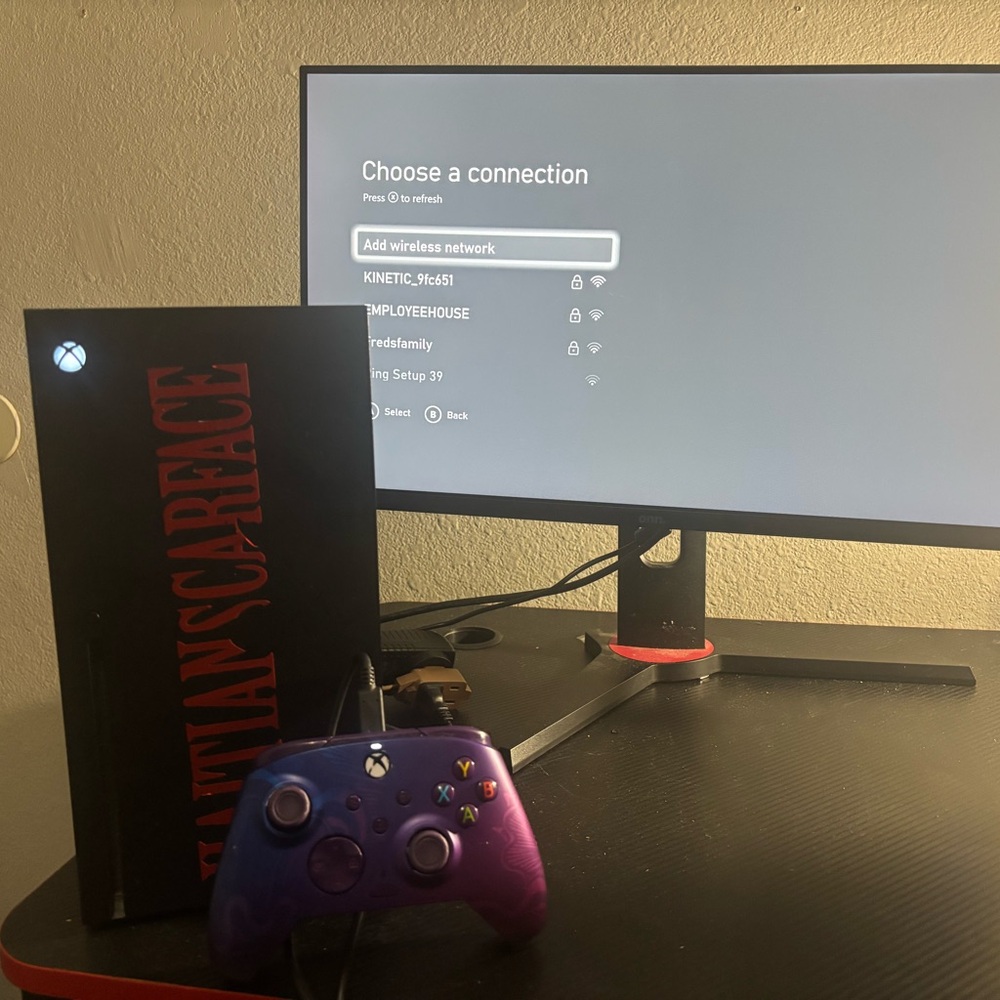 Console with Purple Controller